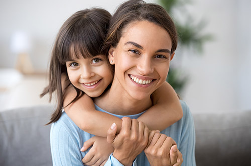 How Pregnancy & Motherhood Affect Your Oral Health